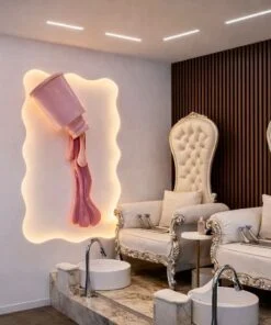 Custom dripping nail polish 3D sculpture with backlit neon surround, installed in a nail salon in Lebanon by Neon Jungle Studios