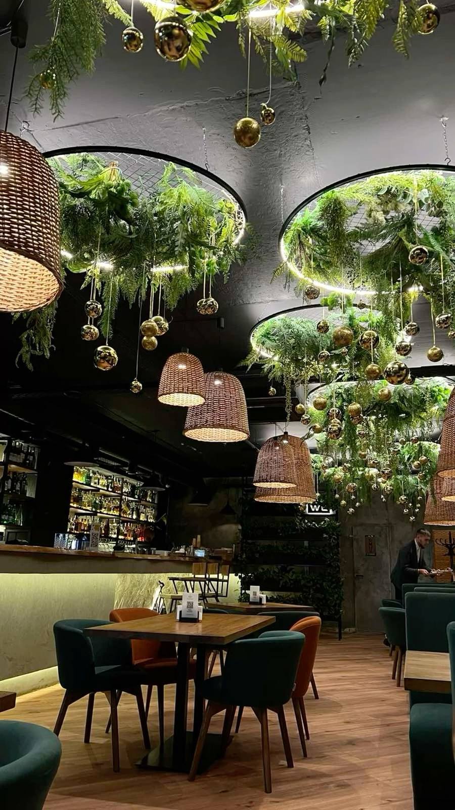 Suspended artificial greenery ceiling in a restaurant
