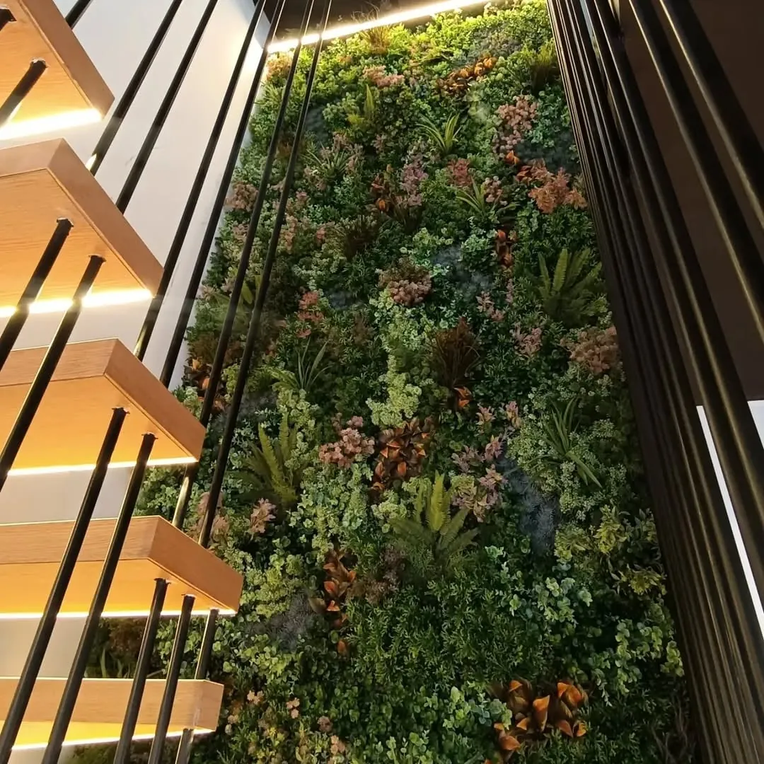7 m green wall with flowers — design atelier, Lebanon — installation by Neon Jungle Studios
