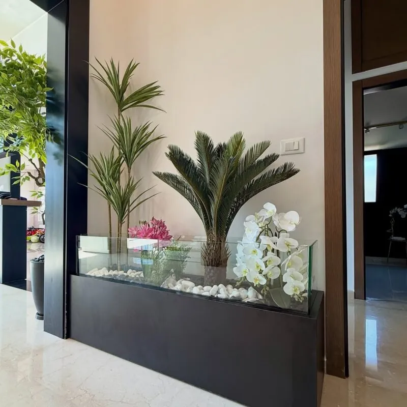 black wood planter box with palms and orchids — home entrance, Lebanon — installation by Neon Jungle Studios