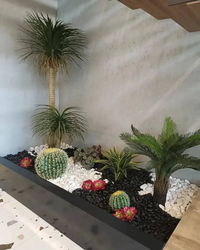 cactus and palm garden — home under a staircase, Lebanon — installation by Neon Jungle Studios