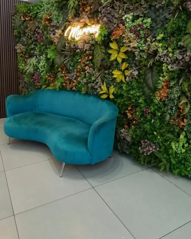 colourful vertical garden with a neon word — restaurant, Lebanon — installation by Neon Jungle Studios