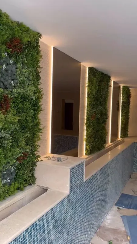 lit green wall panels — indoor pool, Lebanon — installation by Neon Jungle Studios
