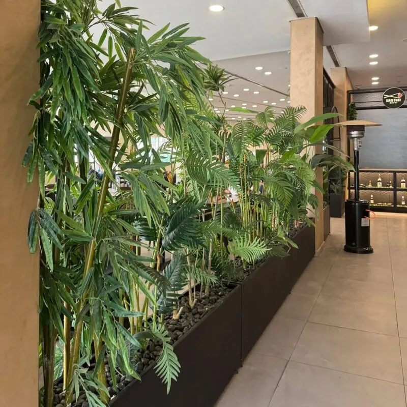 long planter of bamboo and palms — terrace, Lebanon — installation by Neon Jungle Studios