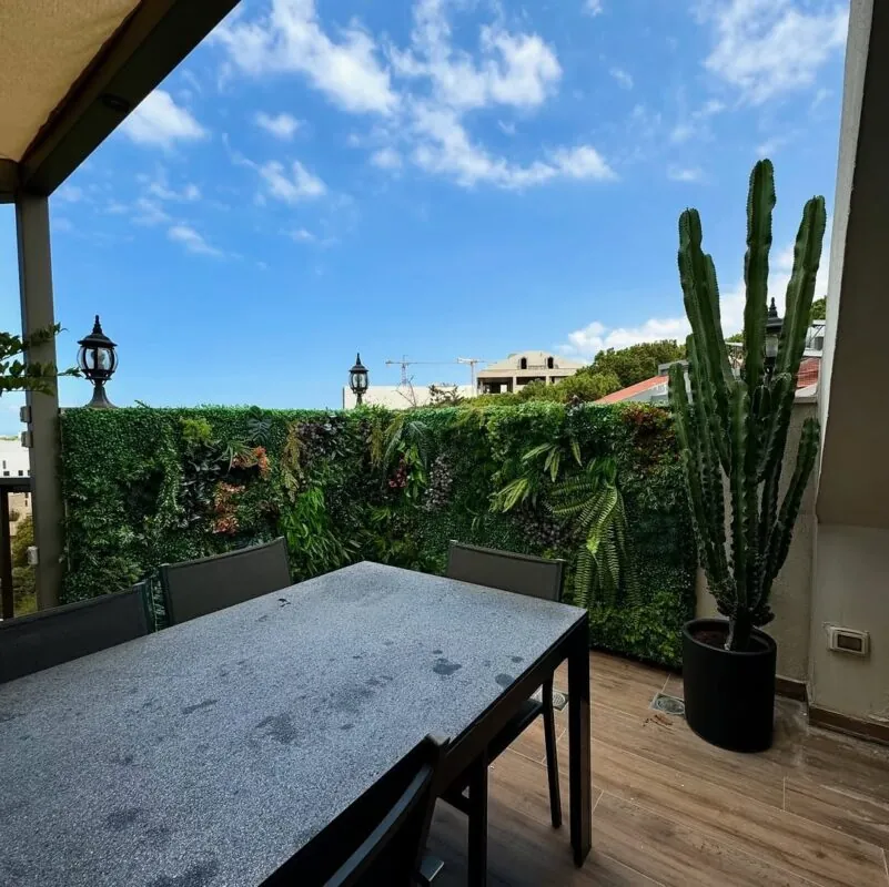 outdoor anti-UV vertical garden — terrace dining area, Lebanon — installation by Neon Jungle Studios