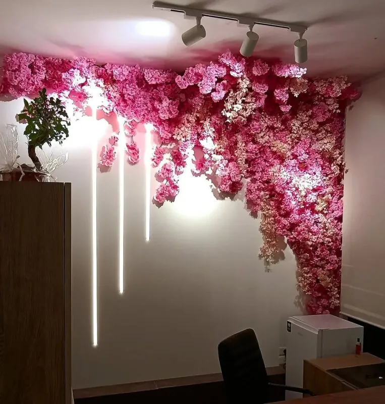 pink cherry blossom climbing to the ceiling — commercial interior, Lebanon — installation by Neon Jungle Studios