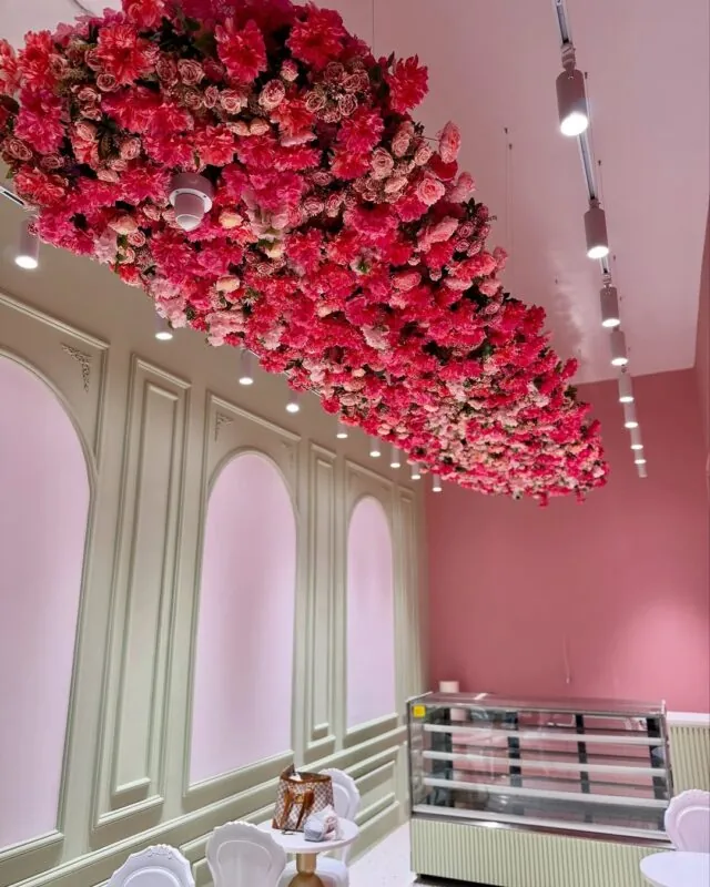 pink floral ceiling installation — pastry shop, Lebanon — installation by Neon Jungle Studios