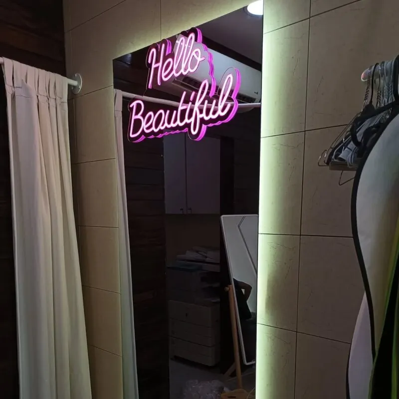 pink handwritten neon phrase — fashion shop fitting room, Lebanon — installation by Neon Jungle Studios
