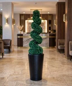 Spiral Topiary Tree 160 cm styled in an interior — Neon Jungle Studios