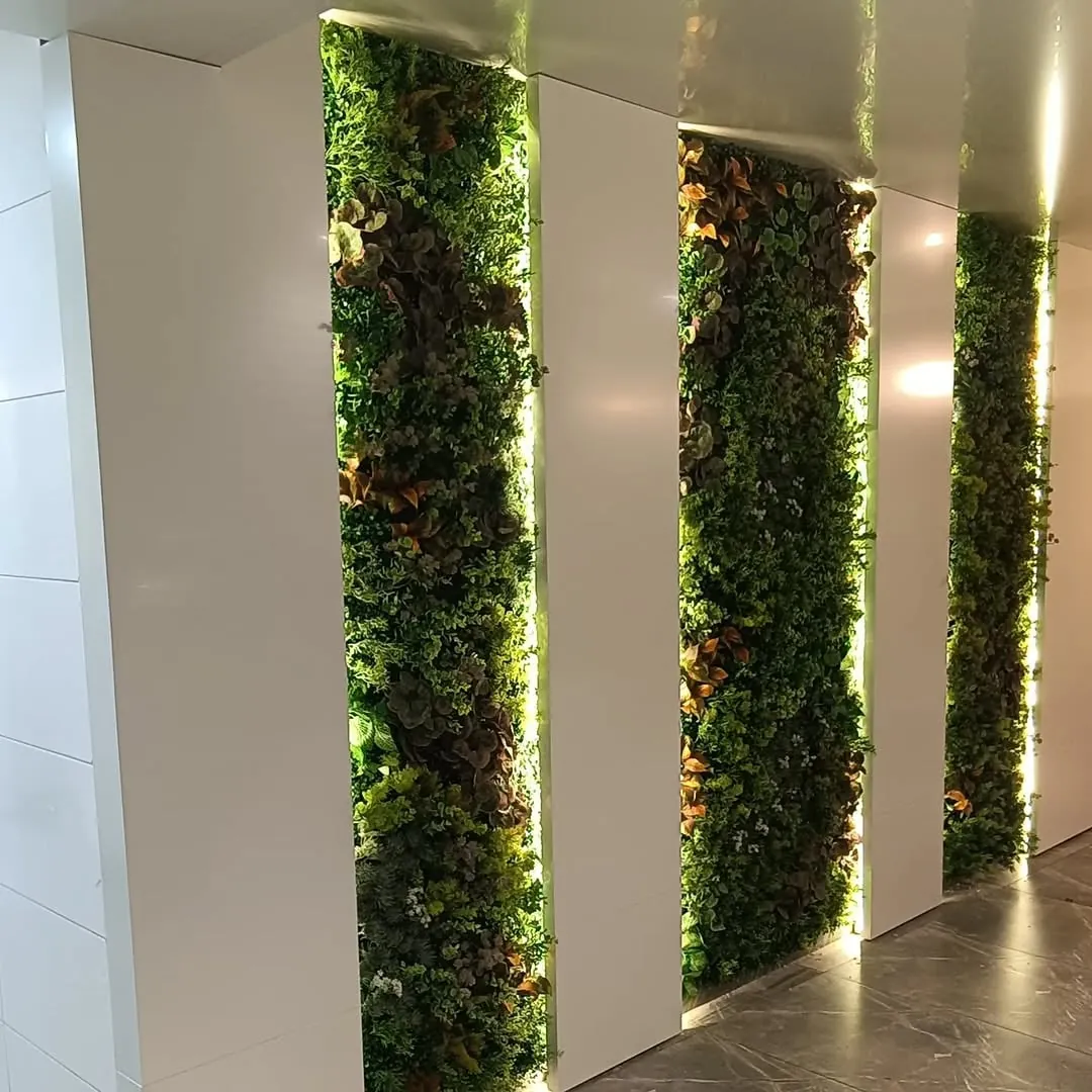 vertical garden columns with lighting — restaurant entrance, Lebanon — installation by Neon Jungle Studios
